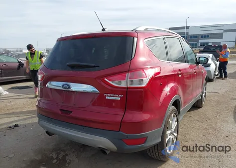 2016 Ford Escape Titanium z USA, uszkodzony, nr VIN 1FMCU0J99GUC78277